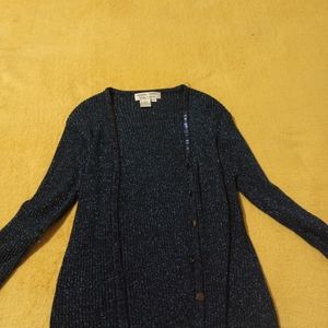 A blue sweater and the matching shirt